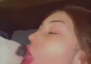 Brunette makes out with a dog and it's hella fun